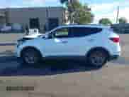 2018 Hyundai Santa Fe 2.4L z VIN 5NMZUDLB1JH067028, wystawiony jako IAAI lot #43358213 z przebiegiem 128 987 mil mil oraz . Historia ofert i sprzedaży dostępna na DreamBid. Obrazek 14.