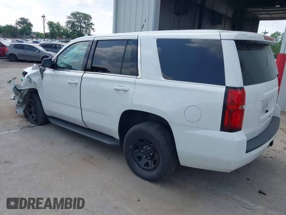 2018 Chevrolet Tahoe Commercial with VIN 1GNLCDEC6JR182144, listed as a IAAI auction lot 42734254 with 182,628 mi miles and . Bid and sale history available at DreamBid. Image 3.