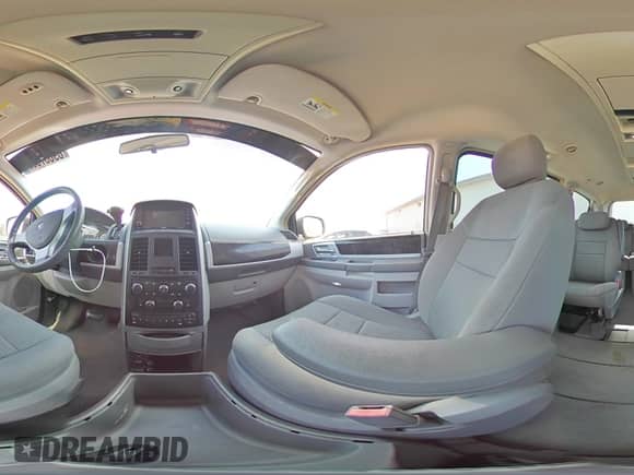 2010 Dodge Grand Caravan SXT with VIN 2D4RN5DX5AR125907, listed as a Copart auction lot 69637335 with 211,789 mi miles and Salvage title. Bid and sale history available at DreamBid. Image 15.