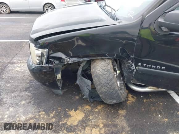 2007 Chevrolet Tahoe LT z VIN 1GNFC13027R345692, wystawiony jako IAAI lot #42195163 z przebiegiem Nie podano mil oraz . Historia ofert i sprzedaży dostępna na DreamBid. Obrazek 6.