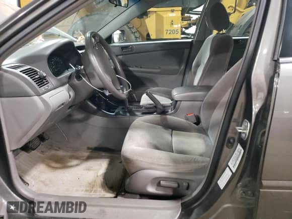 2003 Toyota Camry LE with VIN 4T1BE32K93U744134, listed as a Copart auction lot 70332795 with 208,689 mi miles and Salvage title. Bid and sale history available at DreamBid. Image 7.