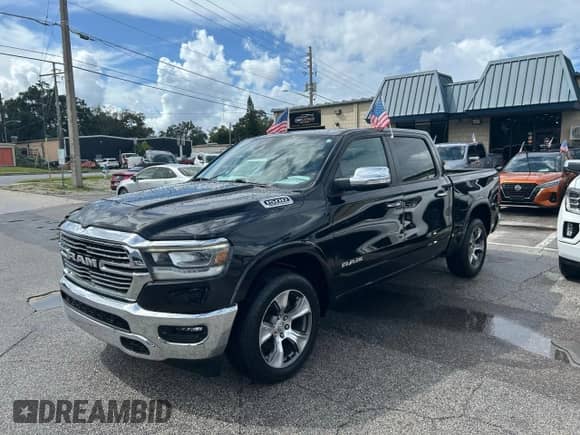 2021 Ram 1500 Laramie with VIN 1C6SRFJT3MN752107, listed as a Copart auction lot 86319005 with 125,416 mi miles and Clean title. Bid and sale history available at DreamBid. Image 2.