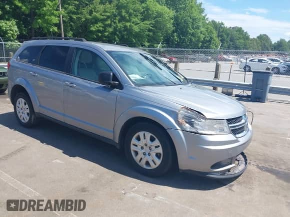 2019 Dodge Journey SE Value with VIN 3C4PDCAB7KT870550, listed as a IAAI auction lot 42327883 with 128,002 mi miles and . Bid and sale history available at DreamBid. Image 1.