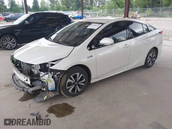 2018 Toyota Prius Plus z VIN JTDKARFP6J3073923, wystawiony jako IAAI lot #42580231 z przebiegiem 119 619 mil mil oraz . Historia ofert i sprzedaży dostępna na DreamBid. Obrazek 2.
