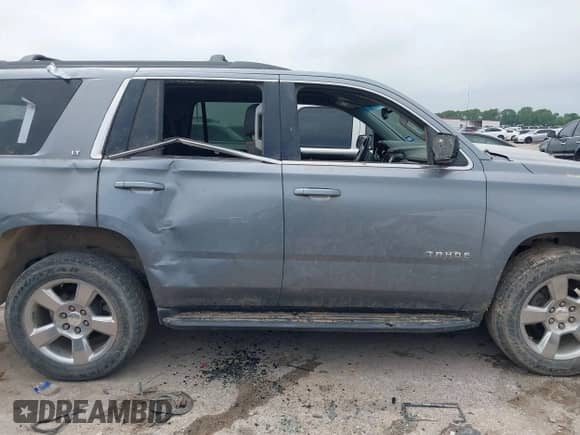 2020 Chevrolet Tahoe LT with VIN 1GNSCBKC1LR103972, listed as a IAAI auction lot 42148438 with 94,640 mi miles and . Bid and sale history available at DreamBid. Image 13.