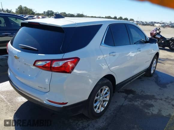 2020 Chevrolet Equinox LT z VIN 2GNAXUEV2L6208430, wystawiony jako IAAI lot #41217793 z przebiegiem 117 822 mil mil oraz . Historia ofert i sprzedaży dostępna na DreamBid. Obrazek 4.