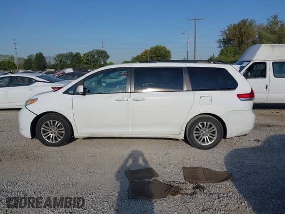 2011 Toyota Sienna XLE AAS with VIN 5TDYK3DC4BS030573, listed as a IAAI auction lot 43196976 with 290,800 mi miles and . Bid and sale history available at DreamBid. Image 14.