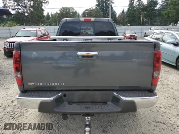 2012 Chevrolet Colorado 2LT with VIN 1GCJSDFE2C8129243, listed as a Copart auction lot 64320975 with 96,921 mi miles and Salvage title. Bid and sale history available at DreamBid. Image 6.