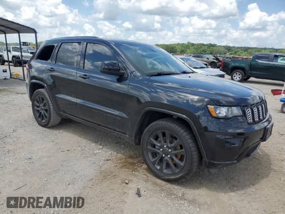 2019 Jeep Grand Cherokee Altitude with VIN 1C4RJEAG1KC732748, listed as a Copart auction lot 63328255 with 145,585 mi miles and Salvage title. Bid and sale history available at DreamBid. Image 4.