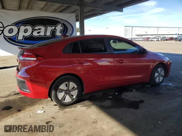 2022 Hyundai Ioniq Blue with VIN KMHC65LC8NU268014, listed as a Copart auction lot 82673775 with 82,395 mi miles and Salvage title. Bid and sale history available at DreamBid. Image 3.