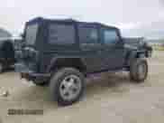 2007 Jeep Wrangler Unlimited Rubicon with VIN 1J4GA69117L112867, listed as a Copart auction lot 59909565 with 166,963 mi miles and Salvage title. Bid and sale history available at DreamBid. Image 3.