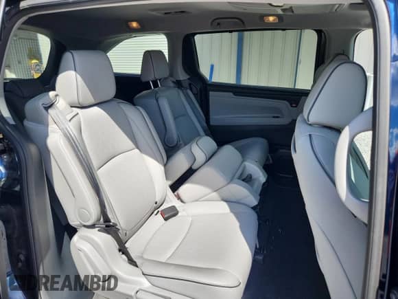 2023 Honda Odyssey Elite with VIN 5FNRL6H93PB059799, listed as a Copart auction lot 71438545 with 22,641 mi miles and Salvage title. Bid and sale history available at DreamBid. Image 11.