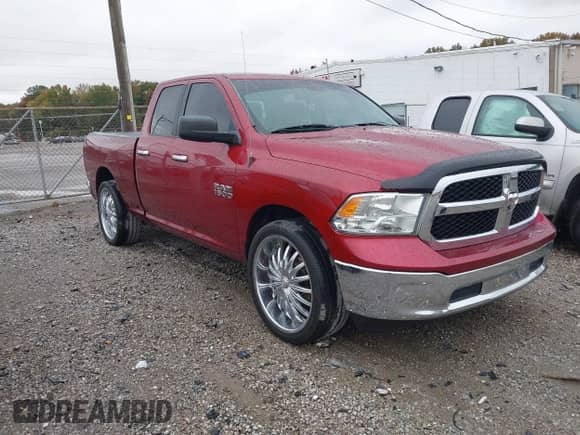 2015 Ram 1500 SLT z VIN 1C6RR6GG8FS674677, wystawiony jako IAAI lot #43548789 z przebiegiem 206 330 mil mil oraz . Historia ofert i sprzedaży dostępna na DreamBid. Obrazek 1.