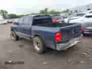 2005 Dodge Dakota SLT with VIN 1D7HE48NX5S165812, listed as a IAAI auction lot 42479950 with 147,645 mi miles and . Bid and sale history available at DreamBid. Image 3.