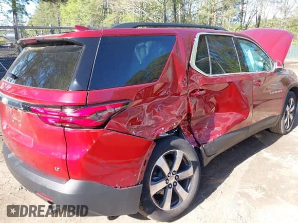 2023 Chevrolet Traverse LT with VIN 1GNERHKW4PJ232429, listed as a IAAI auction lot 41996119 with 11,928 mi miles and . Bid and sale history available at DreamBid. Image 6.