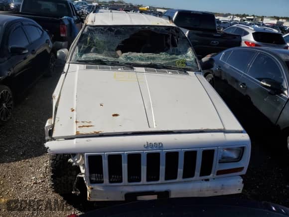 2001 Jeep Grand Cherokee с VIN 1J4FT47S21L596528, выставлен на аукционе Copart как лот 68641764 с пробегом Не указан миль и Списание • Salvage title. История ставок и продаж доступна на DreamBid. Изображение 5.