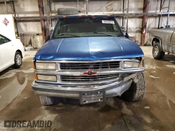 1997 Chevrolet Silverado 2500 z VIN 1GCGK29J7VE241077, wystawiony jako Copart lot #43543075 z przebiegiem 221 466 mil mil oraz Szkoda całkowita • Salvage title. Historia ofert i sprzedaży dostępna na DreamBid. Obrazek 5.