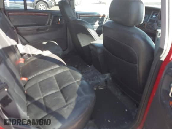 1997 Jeep Grand Cherokee Limited с VIN 1J4GZ78Y3VC614614, выставлен на аукционе IAAI как лот 43011679 с пробегом 203 473 миль миль и . История ставок и продаж доступна на DreamBid. Изображение 8.