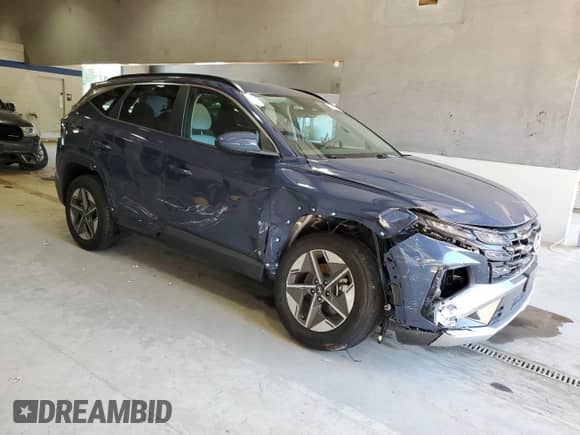 2025 Hyundai Tucson SEL with VIN 5NMJBCDE0SH448134, listed as a Copart auction lot 70383715 with 11,067 mi miles and Salvage title. Bid and sale history available at DreamBid. Image 4.
