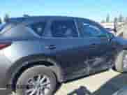 2023 Mazda CX-5 S Carbon Edition z VIN JM3KFBCM6P0143148, wystawiony jako IAAI lot #43382486 z przebiegiem 22 099 mil mil oraz . Historia ofert i sprzedaży dostępna na DreamBid. Obrazek 13.
