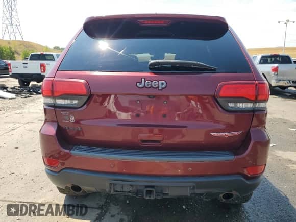 2020 Jeep Grand Cherokee Trailhawk with VIN 1C4RJFLT0LC133857, listed as a Copart auction lot 68354855 with 110,353 mi miles and Salvage title. Bid and sale history available at DreamBid. Image 6.