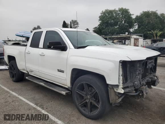 2016 Chevrolet Silverado 1500 LT with VIN 1GCRCREH5GZ180454, listed as a Copart auction lot 55177435 with 183,657 mi miles and Salvage title. Bid and sale history available at DreamBid. Image 4.