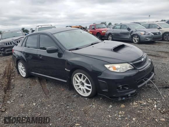 2013 Subaru WRX WRX with VIN JF1GV7F6XDG013619, listed as a Copart auction lot 68992015 with 141,795 mi miles and Salvage title. Bid and sale history available at DreamBid. Image 4.