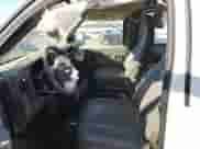 2011 Chevrolet Express Cargo with VIN 1GCWGGFAXB1150161, listed as a Copart auction lot 86826564 with 261,863 mi miles and Salvage title. Bid and sale history available at DreamBid. Image 7.