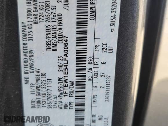 2020 Ford F-150 XL with VIN 1FTEW1E54LFA00647, listed as a Copart auction lot 69217055 with 52,667 mi miles and Salvage title. Bid and sale history available at DreamBid. Image 12.