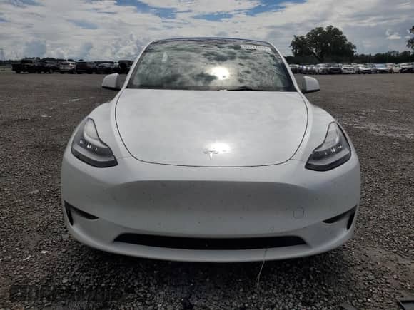 2022 Tesla Model Y Long Range с VIN 7SAYGDEE8NA012335, выставлен на аукционе Copart как лот 61217094 с пробегом 55 915 миль миль и На запчасти • Non repairable. История ставок и продаж доступна на DreamBid. Изображение 5.