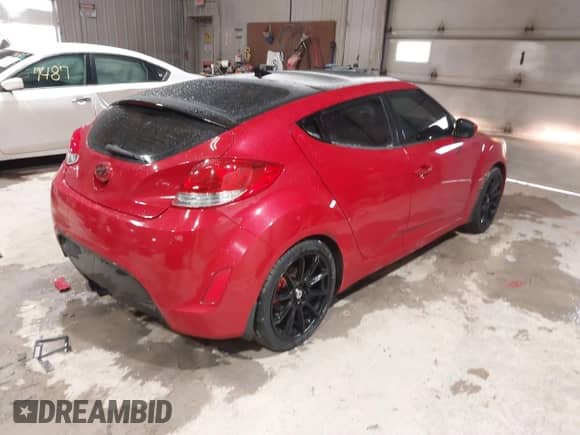 2012 Hyundai Veloster w/Black Int с VIN KMHTC6AD8CU032759, выставлен на аукционе IAAI как лот 41567265 с пробегом 156 973 миль миль и . История ставок и продаж доступна на DreamBid. Изображение 4.