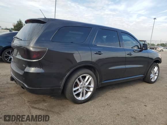 2013 Dodge Durango R/T with VIN 1C4SDJCT7DC696014, listed as a Copart auction lot 65469375 with 123,656 mi miles and Salvage title. Bid and sale history available at DreamBid. Image 3.