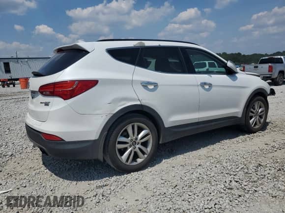 2016 Hyundai Santa Fe с VIN 5XYZW4LAXGG350127, выставлен на аукционе Copart как лот 61919305 с пробегом 167 889 миль миль и Списание • Salvage title. История ставок и продаж доступна на DreamBid. Изображение 3.