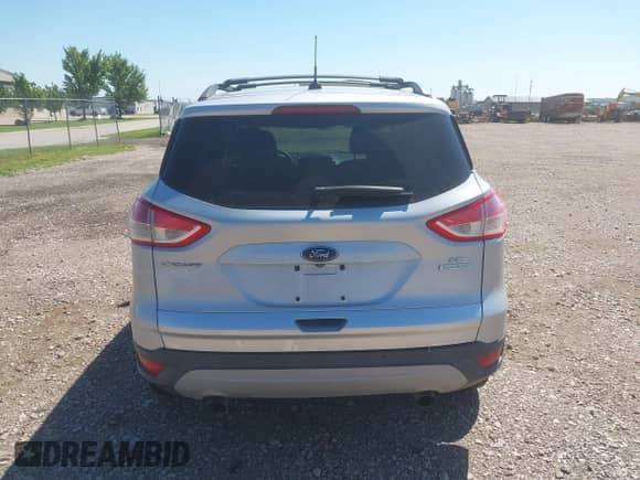 2014 Ford Escape SE z VIN 1FMCU0GX8EUB32407, wystawiony jako IAAI lot #42936937 z przebiegiem 143 936 mil mil oraz . Historia ofert i sprzedaży dostępna na DreamBid. Obrazek 16.