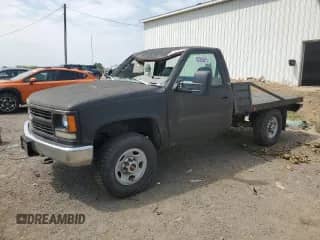 1996 Chevrolet Silverado 2500 с VIN 1GCGK24R5TE237782, выставлен на аукционе Copart как лот 62363975 с пробегом 193 992 миль миль и Чистый • Clean title. История ставок и продаж доступна на DreamBid. Изображение 1.