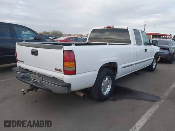 2001 GMC Sierra 1500 SLE z VIN 1GTEC19T01E209579, wystawiony jako IAAI lot #41559767 z przebiegiem 268 789 mil mil oraz . Historia ofert i sprzedaży dostępna na DreamBid. Obrazek 4.