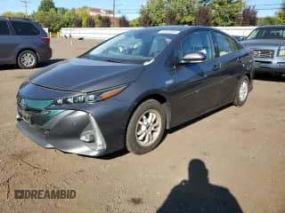 2018 Toyota Prius Plus z VIN JTDKARFP9J3082972, wystawiony jako Copart lot #80618685 z przebiegiem 63 283 mil mil oraz Szkoda całkowita • Salvage title. Historia ofert i sprzedaży dostępna na DreamBid. Obrazek 1.