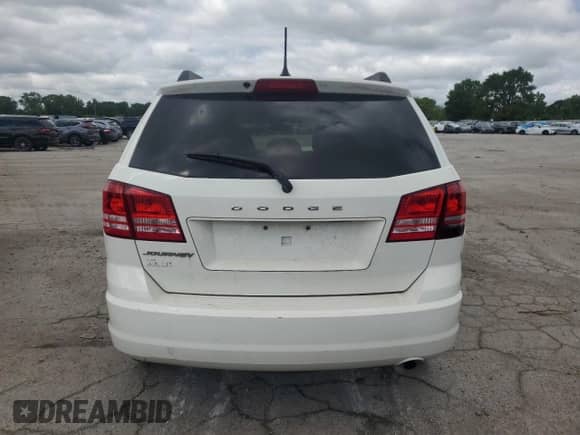 2018 Dodge Journey SE with VIN 3C4PDCABXJT182928, listed as a Copart auction lot 69603635 with 89,646 mi miles and Salvage title. Bid and sale history available at DreamBid. Image 6.