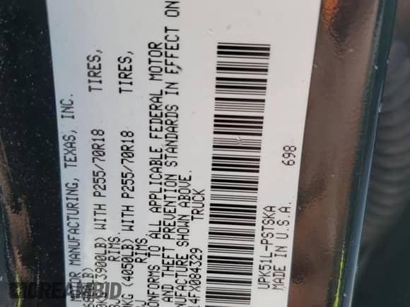 2015 Toyota Tundra SR5 z VIN 5TFEM5F14FX084329, wystawiony jako Copart lot #83789055 z przebiegiem Nie podano mil oraz Szkoda całkowita • Salvage title. Historia ofert i sprzedaży dostępna na DreamBid. Obrazek 12.