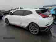 2021 Hyundai Veloster z VIN KMHT36AH5MU009878, wystawiony jako Copart lot #82228223 z przebiegiem 7 082 mil mil oraz . Historia ofert i sprzedaży dostępna na DreamBid. Obrazek 2.