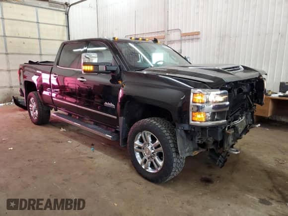 2018 Chevrolet Silverado 2500HD High Country с VIN 1GC1KXEY0JF157645, выставлен на аукционе Copart как лот 68149185 с пробегом 124 791 миль миль и Списание • Salvage title. История ставок и продаж доступна на DreamBid. Изображение 4.