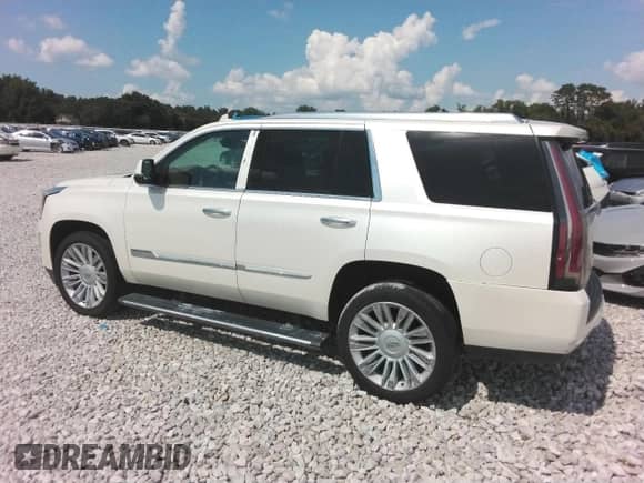 2015 Cadillac Escalade Platinum z VIN 1GYS4PKJXFR582439, wystawiony jako Copart lot #65702115 z przebiegiem 172 677 mil mil oraz Czysty tytuł • Clean title. Historia ofert i sprzedaży dostępna na DreamBid. Obrazek 2.