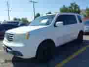 2014 Honda Pilot Touring z VIN 5FNYF4H95EB047979, wystawiony jako IAAI lot #43526927 z przebiegiem 158 501 mil mil oraz . Historia ofert i sprzedaży dostępna na DreamBid. Obrazek 2.