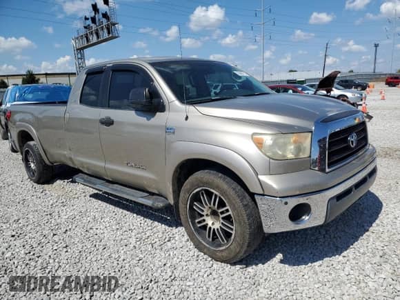 2007 Toyota Tundra SR5 z VIN 5TFST54137X001807, wystawiony jako Copart lot #70468715 z przebiegiem 259 131 mil mil oraz Szkoda całkowita • Salvage title. Historia ofert i sprzedaży dostępna na DreamBid. Obrazek 4.