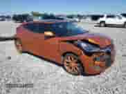 2013 Hyundai Veloster w/Black Int z VIN KMHTC6AD2DU156852, wystawiony jako Copart lot #82449685 z przebiegiem 106 546 mil mil oraz Czysty tytuł • Clean title. Historia ofert i sprzedaży dostępna na DreamBid. Obrazek 4.