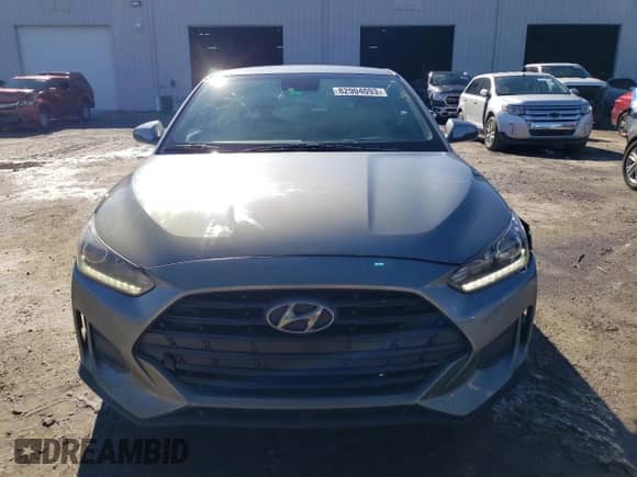 2019 Hyundai Veloster 2.0 z VIN KMHTG6AF1KU017833, wystawiony jako Copart lot #82904093 z przebiegiem 69 556 mil mil oraz . Historia ofert i sprzedaży dostępna na DreamBid. Obrazek 5.