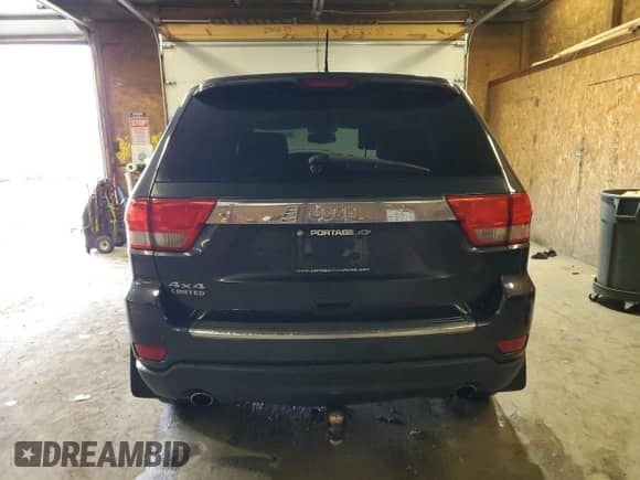 2012 Jeep Grand Cherokee Limited z VIN 1C4RJFBT4CC264632, wystawiony jako Copart lot #90137105 z przebiegiem 214 018 mil mil oraz Czysty tytuł • Clean title. Historia ofert i sprzedaży dostępna na DreamBid. Obrazek 6.