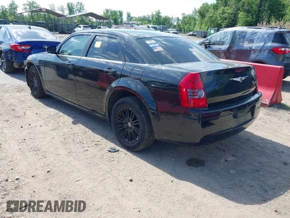 2009 Chrysler 300 LX with VIN 2C3LA43D19H529597, listed as a IAAI auction lot 42180201 with 114,974 mi miles and . Bid and sale history available at DreamBid. Image 3.