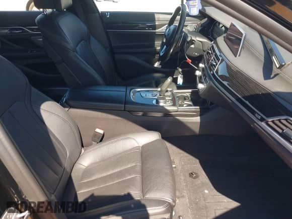 2019 BMW 7 Series 740i xDrive with VIN WBA7E4C57KGV70521, listed as a IAAI auction lot 41881538 with 114,480 mi miles and . Bid and sale history available at DreamBid. Image 5.