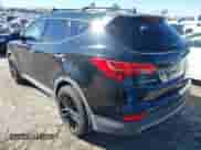 2014 Hyundai Santa Fe with VIN 5XYZUDLAXEG151453, listed as a IAAI auction lot 43479084 with 127,090 mi miles and . Bid and sale history available at DreamBid. Image 3.
